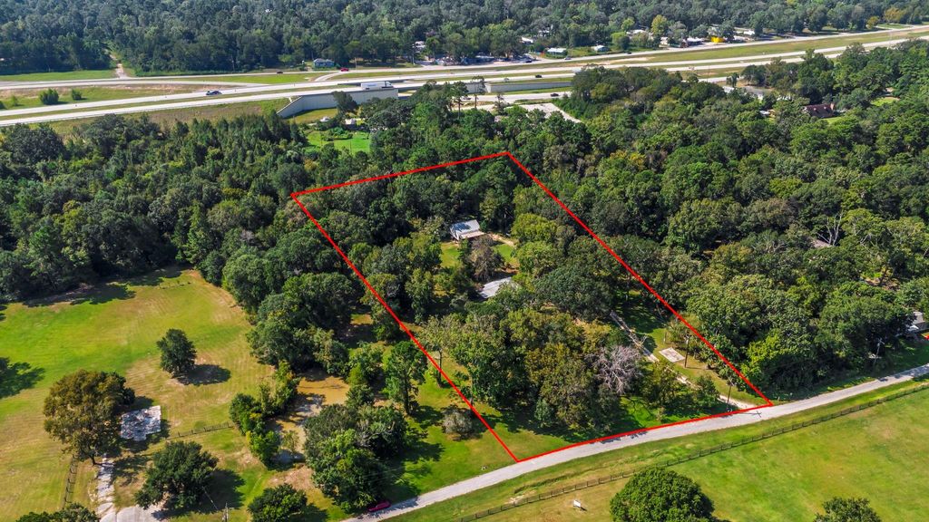 Photo of 28140 Seven Sisters Road, New Caney, TX 77357 (MLS # 28973414)