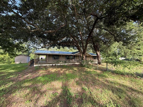 Photo of 10355 Fm 1004 RD, Buna, TX 75956 (MLS # 6169237)