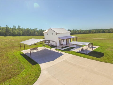 Photo of 1275 Castlewood Road, Livingston, TX 77351 (MLS # 89605117)