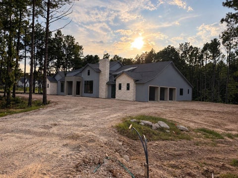 Photo of 4816 Hawk Canyon Court, Montgomery, TX 77316 (MLS # 96068199)