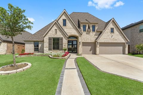 Photo of 7707 Laurel Bloom Lane Ln, Katy, TX 77493 (MLS # 32636580)