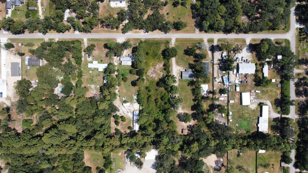 Photo of 17514 Grove Lane, New Caney, TX 77357 (MLS # 63564783)