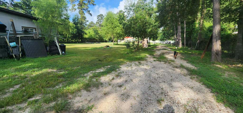 Photo of 17514 Grove Lane, New Caney, TX 77357 (MLS # 63564783)