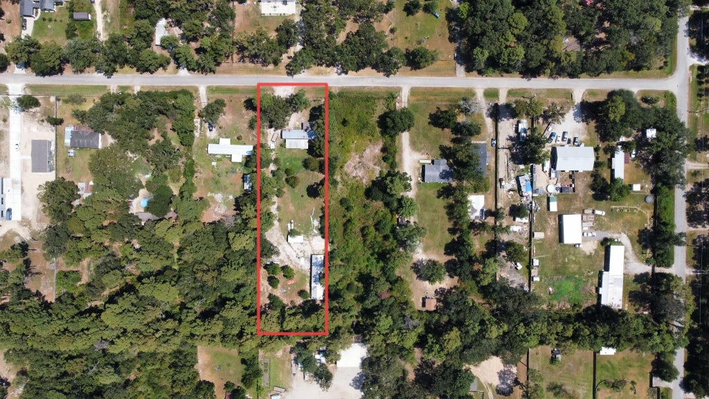 Photo of 17514 Grove Lane, New Caney, TX 77357 (MLS # 63564783)