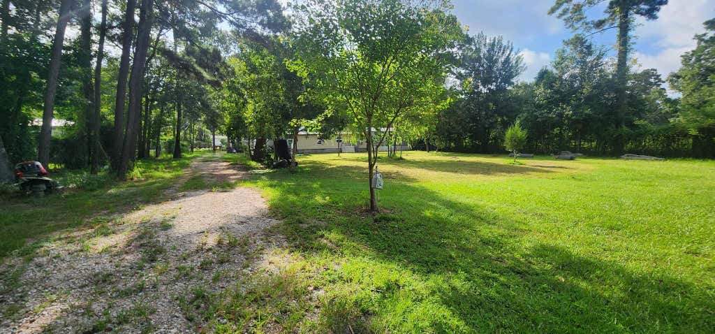 Photo of 17514 Grove Lane, New Caney, TX 77357 (MLS # 63564783)