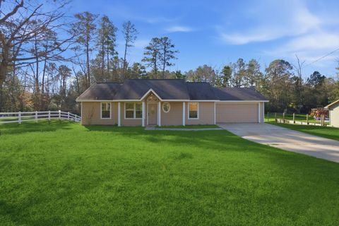 Photo of 10832 Royal Forest Drive, Conroe, TX 77303 (MLS # 60146176)