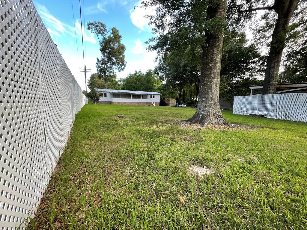Photo of 25934 Pine Drive, New Caney, TX 77357 (MLS # 26999966)
