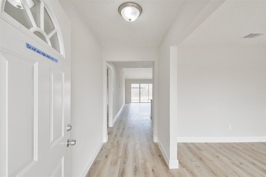 Photo of 12523 Drifting Winds Drive, Houston, TX 77044 (MLS # 60369264)