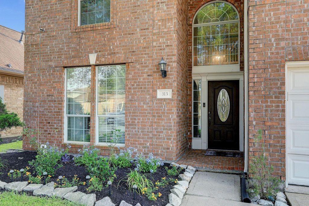 Photo of 313 Marina Oaks Court, League City, TX 77565 (MLS # 49729149)