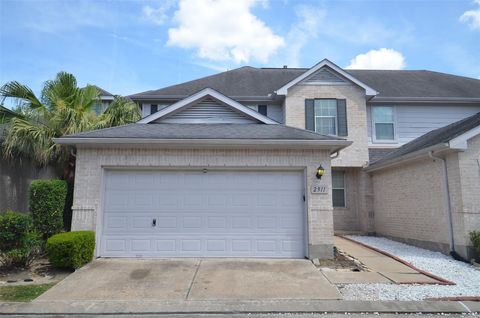 Photo of 2911 Meadowglen Cove, Houston, TX 77082 (MLS # 10678858)