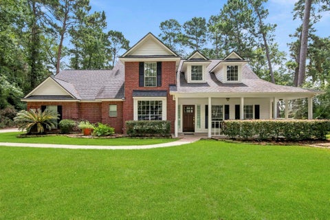 Photo of 14 Creek Forest Lane, Conroe, TX 77384 (MLS # 27954059)