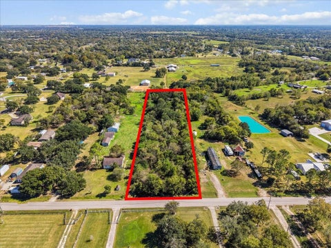 Photo of 5029 Ike Franks Road, Santa Fe, TX 77517 (MLS # 36339738)