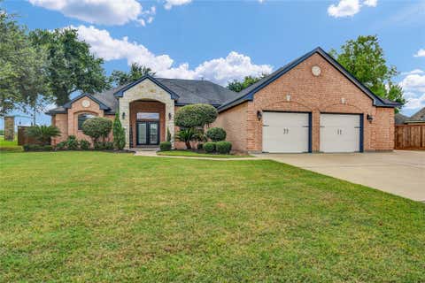 Photo of 101 Deerwood Drive Dr, Lake Jackson, TX 77566 (MLS # 58043516)