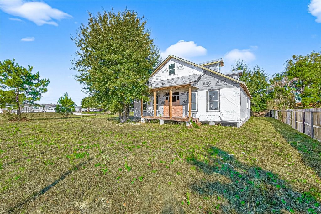 Photo of 449 County Road 3566, Cleveland, TX 77327 (MLS # 51857154)