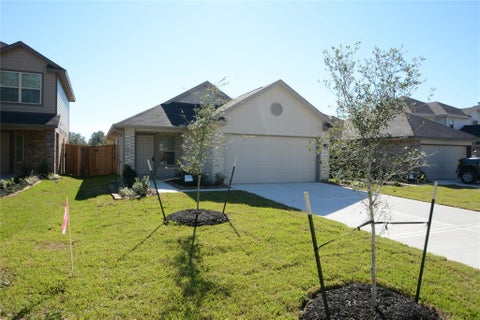 Photo of 1319 Winding Willow Drive, Pinehurst, TX 77362 (MLS # 68993490)