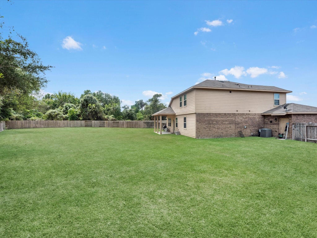 Photo of 7919 Ponte Maria Trail, Houston, TX 77044 (MLS # 92520434)
