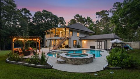 Photo of 39 Creek Forest Lane, Conroe, TX 77384 (MLS # 85260060)