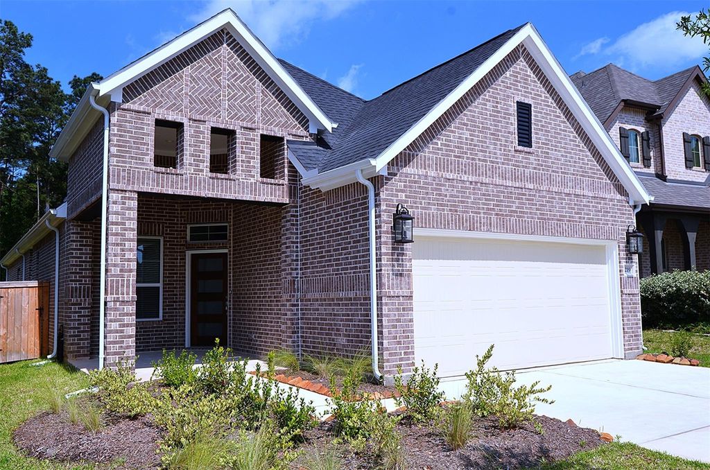 Photo of 219 Lukewood Circle, Willis, TX 77318 (MLS # 63788784)