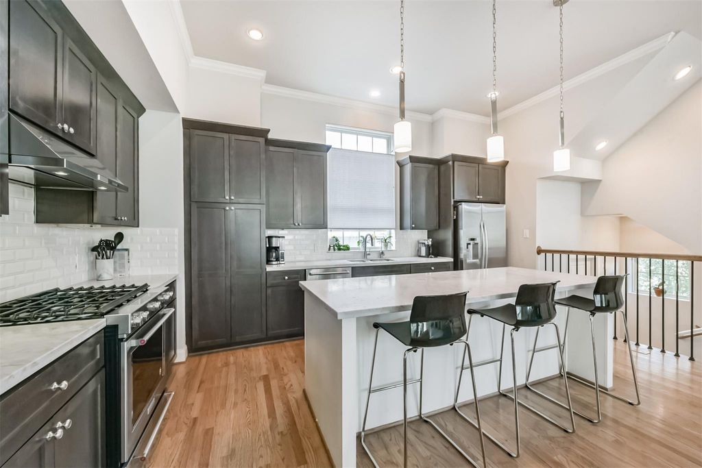 Photo of 1040 W 26th Street #E, Houston, TX 77008 (MLS # 9313294)