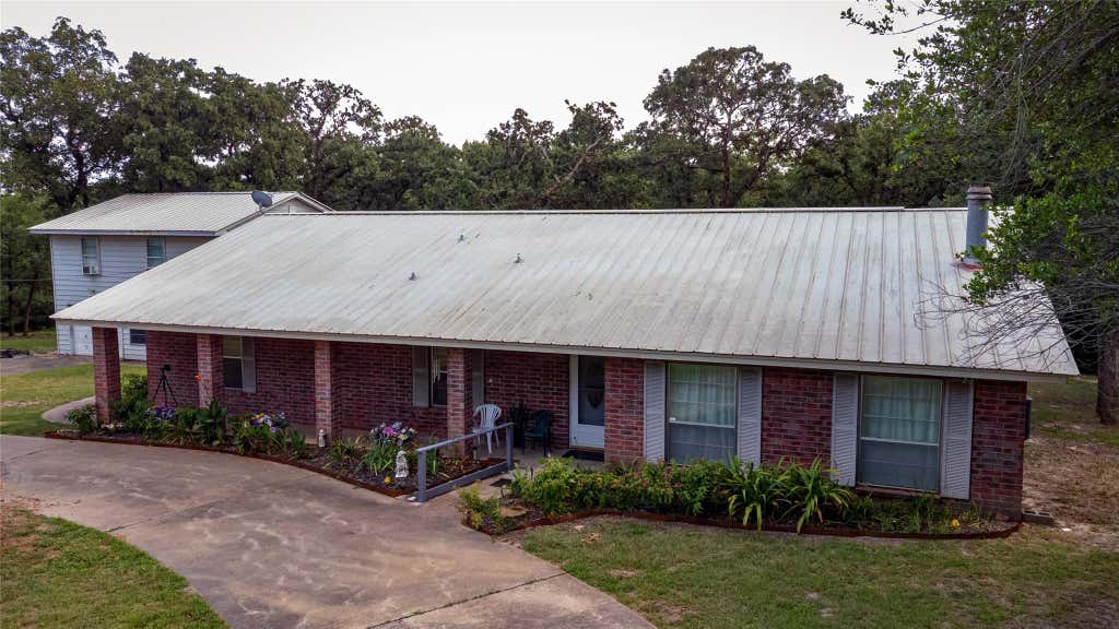 Photo of 1213 Lakeland Loop, Hilltop Lakes, TX 77871 (MLS # 44614501)