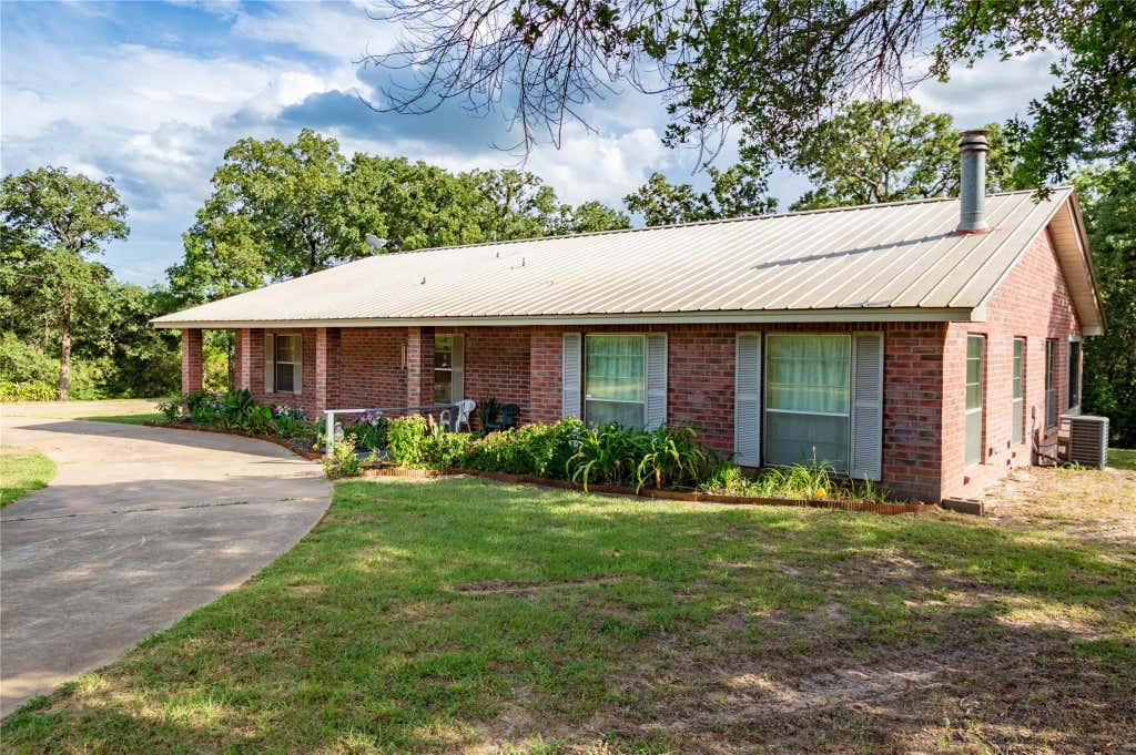Photo of 1213 Lakeland Loop, Hilltop Lakes, TX 77871 (MLS # 44614501)