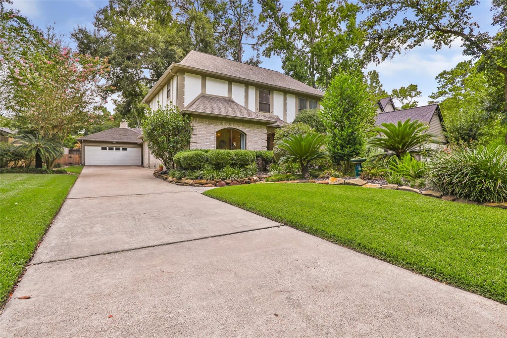 Photo of 2407 Trail River Drive, Houston, TX 77345 (MLS # 57774033)