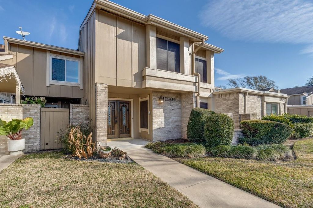 Photo of 11504 Village Place Drive #107, Houston, TX 77077 (MLS # 8473849)