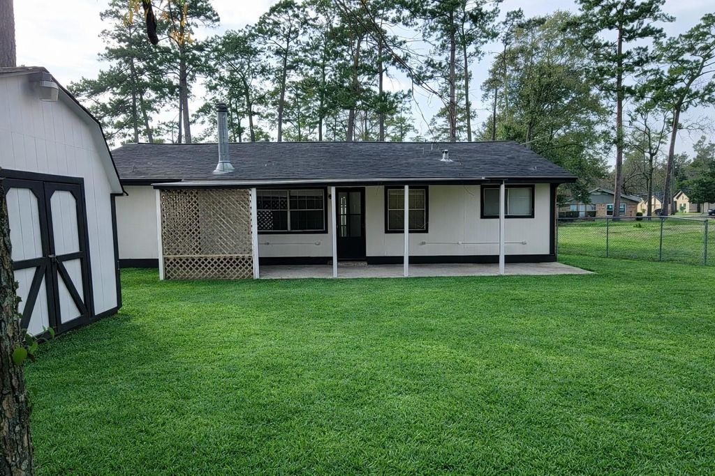 Photo of 430 Eastwood Drive, Woodbranch, TX 77357 (MLS # 80203339)