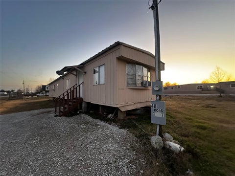 Photo of 40 County Rd 3557, Cleveland, TX 77327 (MLS # 56237462)