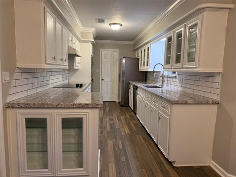 Photo of 2234 Woodland Springs Street, Houston, TX 77077 (MLS # 60154431)