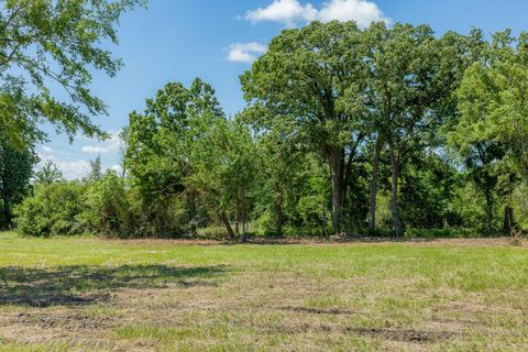 Photo of 6512 Atakapan Trail Trl, Bedias, TX 77831 (MLS # 82190660)