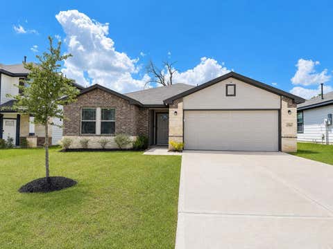 Photo of 11760 Whirlaway Drive, Willis, TX 77318 (MLS # 72321889)