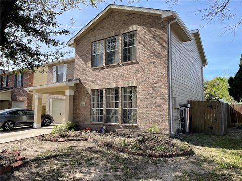 Photo of 12811 Smokey Pass Circle, Houston, TX 77038 (MLS # 86551370)