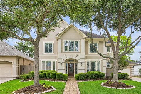 Photo of 14211 Quiet Bluff Lane, Houston, TX 77077 (MLS # 77982112)