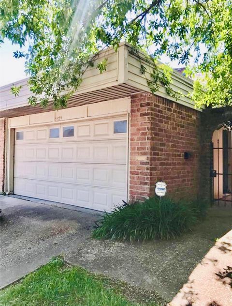 Photo of 5329 Lost Forest Dr Drive #5329, Houston, TX 77092 (MLS # 10266796)