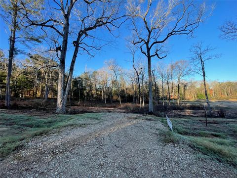 Photo of 11357 Annie Creek Drive Dr, Willis, TX 77378 (MLS # 83693601)