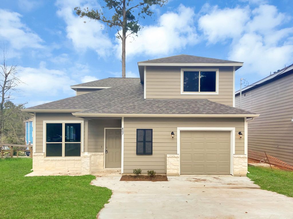 Photo of 807 Comanche Road, Conroe, TX 77316 (MLS # 31999638)