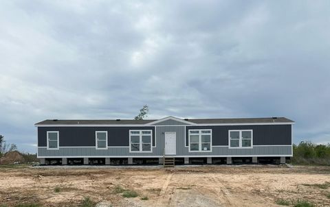 Photo of 2332 Rd 5731, Cleveland, TX 77327 (MLS # 58994430)