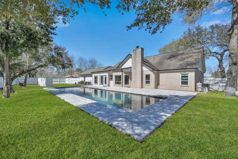 Photo of 10420 Hufsmith Road, Tomball, TX 77375 (MLS # 83404500)