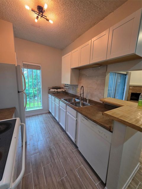 Photo of 8334 Jorine Drive #8334, Houston, TX 77036 (MLS # 39981339)