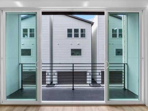 Photo of 4802 Elysian Street #E, Houston, TX 77009 (MLS # 9806021)