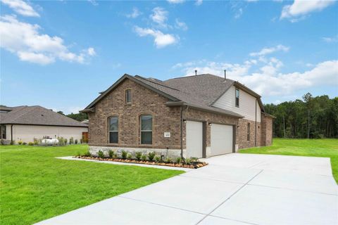 Photo of 600 Barton Place Drive, Tarkington, TX 77327 (MLS # 41377383)