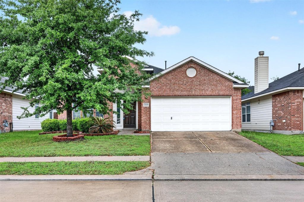 Photo of 11630 Forest Wind Lane, Houston, TX 77066 (MLS # 74666585)
