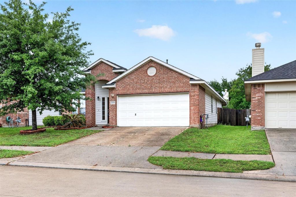 Photo of 11630 Forest Wind Lane, Houston, TX 77066 (MLS # 74666585)