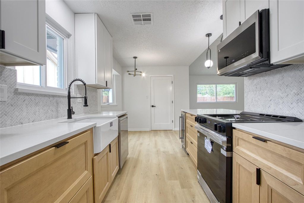 Photo of 5802 Chrystell Lane, Houston, TX 77092 (MLS # 21568998)