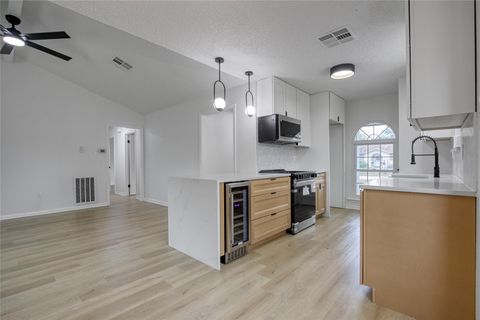 Photo of 5802 Chrystell Lane, Houston, TX 77092 (MLS # 21568998)