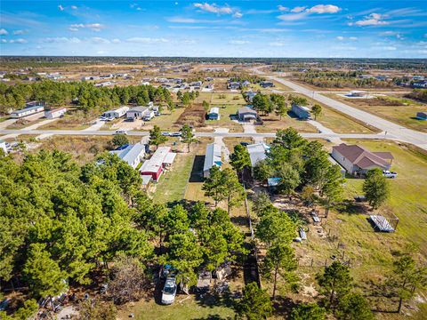 Photo of 503 Road 5605, Cleveland, TX 77327 (MLS # 98179821)