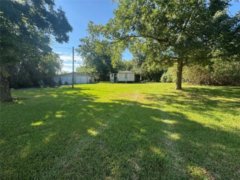 Photo of 813 E Canal Road, Highlands, TX 77562 (MLS # 83971578)