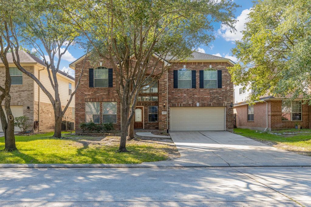 Photo of 22012 Royal Timbers Drive, Kingwood, TX 77339 (MLS # 84571039)