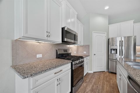 Photo of 18007 Nanpu Lane, Houston, TX 77044 (MLS # 23013204)